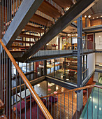 View from staircase into open-plan storeys of architect-designed house