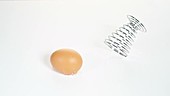 Egg bouncing in eggcup, slow motion