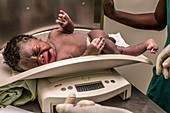 Weighing baby born by caesarean section