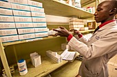 Pharmacist handling antibiotics