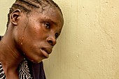 Woman sweating due to malaria