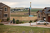 Fracking site near homes, Colorado, USA