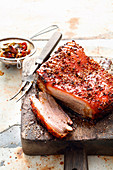 Grilled pork belly with a honey and lemon mop