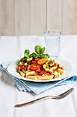 Penne with bolognese sauce and walnuts
