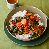 Spiced Turkey Sausage with Black-Eyed Peas and Spinach over rice