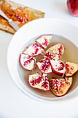 Softened pomegranate pieces