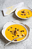 Orange and sweet potato soup with wholemeal croutons