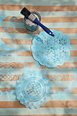 Doilies painted blue