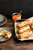 Hellas filo pastry rolls with minced lamb from a baking tray