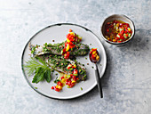 Herb soused herring with a spicy vegetable salsa