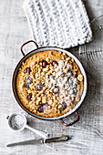 Pan-baked cherry crumble cake with hazelnuts