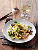 Linguine in a sherry broth with fried porcini mushrooms
