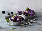 Purple blackberry yoghurt ice cream with pistachio nuts