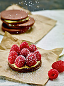 Raspberry tartlets dusted with icing sugar