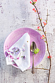 A Spring table setting on a white background