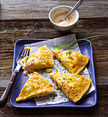 Potato omelettes with paprika and a dip
