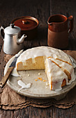 Poke cake: lemon cheesecake with icing, sliced