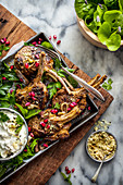 Spiced lamb cutlets with labne, dukkah and pomegranate