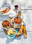 Seafood dip with tomatoes and grilled bread
