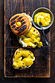 Charred Doughnut with cream cheese and Granadilla Curd