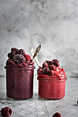 Frozen berry smoothies with bananas, chia seeds and almond milk