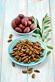 Bowls of fresh and dried olives