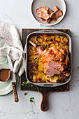 One-pan slow-roasted leg of lamb with scalloped potatoes