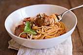 Tagliatelle with meatballs in tomato sauce