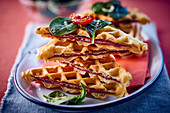 Spicy waffles with bacon and spinach