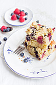 Summer blueberry and raspberry cake with nut crumbs