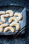 Vegan vanilla crescent biscuits made from almonds and pistachio nuts