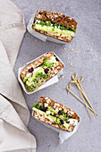Sandwiches with cucumber, feta cheese and hummus