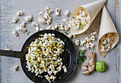 Popcorn with chilli, ginger, garlic and lime