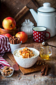 Rice pudding with apples, cinnamon and nuts