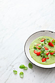 Raw basil cream with strawberries, avocado and corn