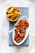 Poultry currywurst with potato wedges