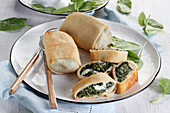 Fried pancake rolls with spinach and ricota