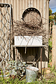 Gardening tools on the outside wall