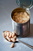 A tin can with white beans
