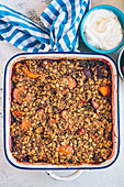 Apricot and plum crumble with quinoa and oatmeal