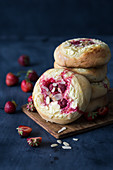 Strawberry buns with cheese filling and almond flakes