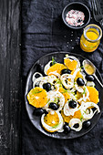 fennel and orange salad with black olives and orange dressin