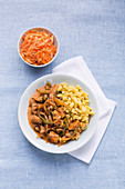 Turkey goulash with Swabian egg pasta and a raw carrot salad