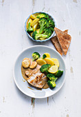Rose fish in a mustard sauce with broccoli and potatoes