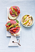 Open sandwiches with corned beef, kohlrabi and pears
