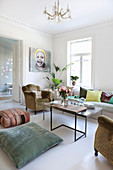 White floor and fresh accents of colour in living room