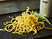 Curly fries with salt and rosemary