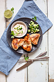 Roast chicken breast with a cucumber dip