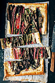 Purple chard, purple vegetables, puff pastry, grated cheese, olive oil