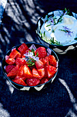 Red berries with rosemary cream